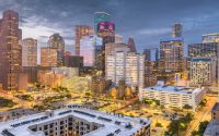 Houston, Texas, USA downtown park and skyline at twilight.
